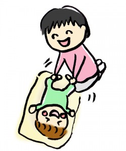 赤ちゃんとスキンシップをするお母さん