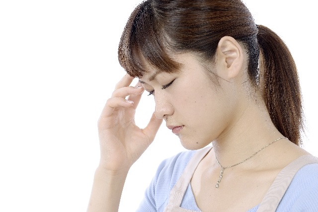頭痛の女性